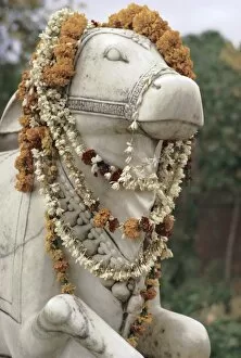 Indian Architecture Gallery: Sacred bull statue and garlands