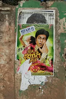 Wall Collection: Shahruk Khan in torn Bollywood movie poster on wall, Hospet, Karnataka, India, Asia