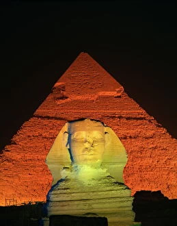 Egypt Gallery: The Sphinx and one of the pyramids illuminated at night, Giza, UNESCO World Heritage Site