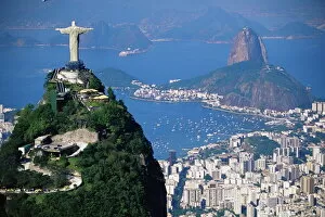 Spiritualism Collection: Statue of Christ the Redeemer overlooking city and Sugar Loaf mountain