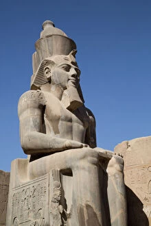 Egypt Gallery: Statue of seated Ramses II, Court of Ramses II, Luxor Temple, Luxor, Thebes, UNESCO