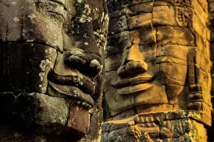 Old Ruins Collection: T wo of 216 smiling sandstone faces at 12th century Bayon, King Jayavarman VII s