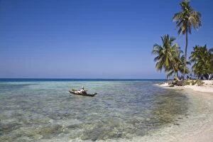 Enjoying Gallery: Tourist in sea cayak, Silk Caye, Belize, Central America