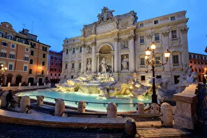 18th Century Collection: View of Trevi Fountain illuminated by street lamps and the lights of dusk, Rome, Lazio