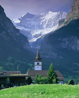 Spiritualism Gallery: Village church and Oberer Grindelwald Glacier