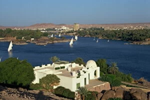 Egypt Collection: White Begum residence overlooking the River Nile with feluccas, at Aswan