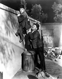 Wall Collection: Stan Laurel and Oliver Hardy in James Parrotts Night Owls (1930)