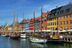 Colorful Gallery: Coloured houses and boats at Nyhavn Quay in Copenhagen, Denmark