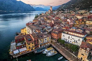 Lake Garda Collection: Aerial sunset view of Malcesine, Lake Garda, Veneto, Italy