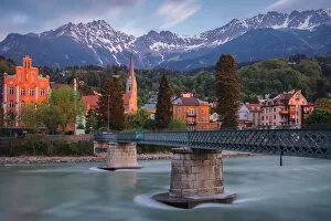 Tourist Attractions Collection: The bridge to Sankt Nikolaus district in Innsbruck at dawn, Tyrol, Austria, Europe