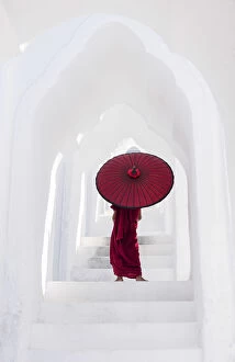 Pagoda Collection: A Buddhist novice monk on the steps of the white pagoda of Hsinbyume (Myatheindan)