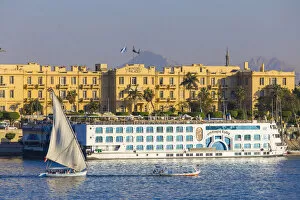 Egypt Collection: Egypt, Luxor, View of Nile cruise boats infront of The Winter Palace Hotel