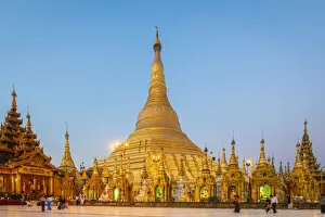 Pagoda Collection: Gilded Shwedagon Pagoda against clear sky at dawn, Yangon, Yangon Region, Myanmar