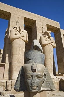 Ancient Egyptian Architecture Gallery: Headless statues of Ramses II line the courtyard at