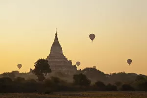 Pagoda Collection: Myanmar (Burma), Bagan, Shwesandaw Pagoda and Hot Air Balloons at Sunrise