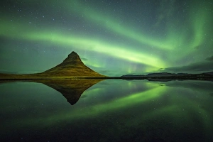 Northern lights above Kirkjufell Mountain, Snaefellsnes peninsula, Western Iceland Northern lights above Kirkjufell Mountain, Snaefellsnes peninsula, Western Iceland