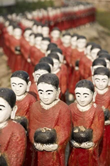 Pagoda Collection: Rakhine state, Myanmar. Monks statues lined up in a pagoda