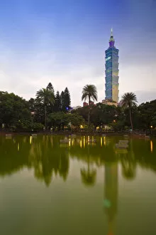 Taiwanese Collection: Taiwan, Taipei, Taipei 101 reflecting in pond