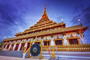 Pagoda Collection: Thailand, Isan, Khon Kaen, Wat Nong Wan illuminated at night