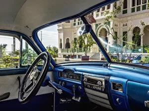 Vintage car in front of Palacio de Valle, Cienfuegos, Cienfuegos Province, Cuba