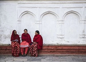Durbar Square Gallery: Women sitting in Durbar Square (UNESCO World Heritage Site), Kathmandu, Nepal