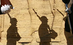 Shadows of the Turkish soldiers are seen on a wall as they wait for the start of a Shadows of the Turkish soldiers are seen on a wall as they wait for the start of a