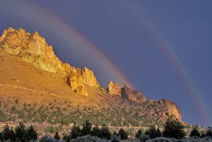 Double rainbow over a rock formation near Smith Rocks State Park. Bend, Central Oregon, USA