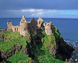 Ruin Collection: Northern Ireland, County Antrim, Dunluce Castle. Picturesque Dunluce Castle attracts