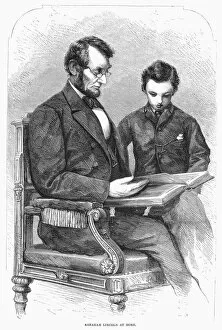 Seated Gallery: (1809-1865). 16th President of the United States. Lincoln at home with his son Thomas Todd (Tad)