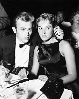 Table Collection: American actor James Dean with Swiss actress Ursula Andress, 9 September 1955