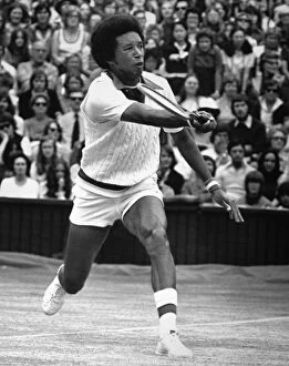 Crowd Collection: ARTHUR ASHE (1943-1993). American tennis player. Photographed during his match against Jimmy