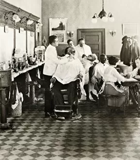 Seated Gallery: BARBER SHOP, 1920. American barber shop