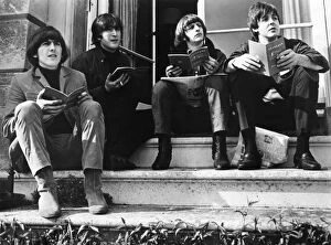 Seated Collection: THE BEATLES, 1965. Left to right: George Harrison, John lennon, Ringo Starr, and Paul McCartney