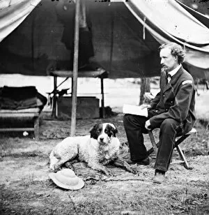 Seated Gallery: CIVIL WAR: CUSTER, 1862. Lieutenant George A. Custer with a dog at camp in Virginia, 1862