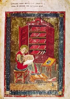 Seated Collection: CODEX AMIATINUS: EZRA. Ezra the scribe writing in a large codex held on his knees