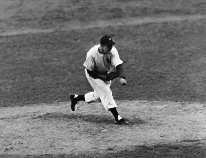 JOE PAGE (1917-1980). American baseball pitcher. Pitching the New York Yankees to victory over the Brooklyn Dodgers in