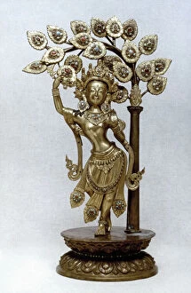 Nepalese Collection: Queen Maya giving birth to Prince Siddhartha, the future Buddha. Nepal, 1825. Gilded brass
