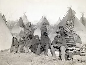Seated Gallery: SIOUX ENCAMPMENT, 1891. Group of Minionjou Sioux Native Americans in a tipi camp