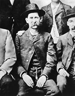 Seated Gallery: WYATT EARP (1848-1929). American lawman. Detail of Earp from a group photograph of the Dodge City