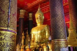 Buddha statue in Wat Mai Suwannaphumaham (aka Vat May) Temple, Luang Prabang, Laos