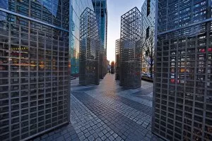 Metal structures beside the office blocks at dusk in the Gangnam district, Seoul, Korea