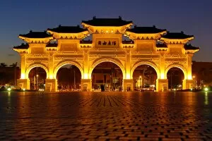 The National Chiang Kai Shek Memorial Hall Main Gate illuminated at night in Taipei, Taiwan