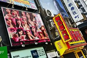 Nightclub and nightlife advertising signs in the red light district of Shinjuku, Tokyo