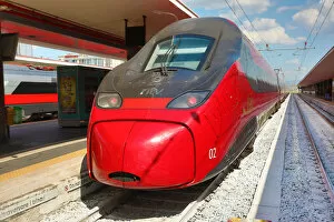 Red Italian high speed train in Naples station, Italy