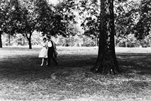 Couple strolling through Green Park