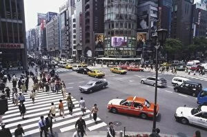 Tourist Attractions Gallery: Japan, Tokyo, Centre, pedestrians and cars at Ginza-Yon-chome crossing