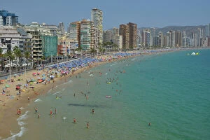 Leisure Activity Collection: Bathers in front of big hotels on Playa Levante, Benidorm, Costa Blanca, Spain beach