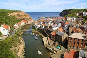 Cliff Collection: An elevated view of the fishing village of Staithes, North Yorkshire, England