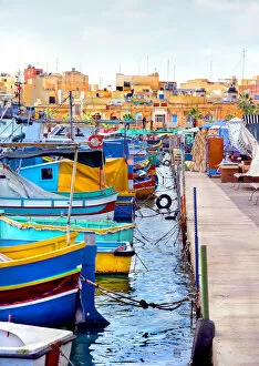 Vibrant Gallery: Fishing boats in harbor of Marsaxlokk