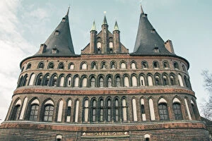 The Holsten Gate or Holstein Tor (Holstentor), a brick gothic city gate at the Hanseatic city of Lubeck, Germany